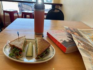 Sitting inside with the OG Farmers Market Breakfast Sammie at Tandem Bakery & Cafe in Missoula