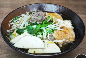 RN5. Pho (Soup)
Flat Rice Noodles, Pho Broth, Nil-beef Slice*, Tofu, Gio Chay* (Steamed Nil-pork Roll), 
Beansprouts, Onion, Spring Onion, Coriander, Mild Red Chilli. at BUDDHA TASTE in South East London