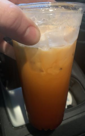 Thai Iced Tea w/coconut milk to go (my dessert) 🤤  at Thai Orchid in Stroudsburg