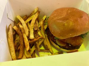 Sweet Heat Chick'n Sandwich and Fries at Oops All Vegan in Jackson