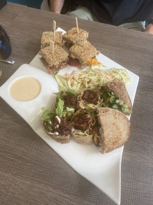 Vegan platter. Mini burger, chick’n pitta and pulled jackfruit wrap  at Elysian Plant Based Kitchen Bar in Limassol