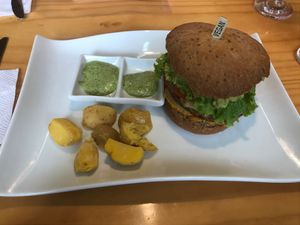 Vegan Burger with papas criollas. at VEGANO El Buen Alimento in Cali