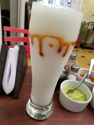 Natural juice with a little syrup in the glass at VEGANO El Buen Alimento in Cali