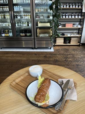 There are a few tables and seats if you want to eat in  at Wild & The Moon - Van Woustraat in Amsterdam