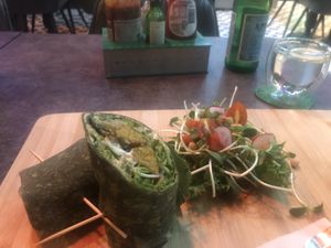 Falafel wrap with side salad  at The Vegan Table in Bangkok