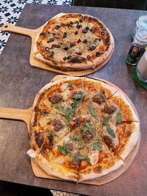 Fridays from 4-7pm is buy one get one free on pizzas. These two only cost 399 baht.  at The Vegan Table in Bangkok