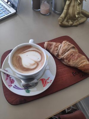 Cappuccino and vegan croissant at Beans and Tales in Malmo