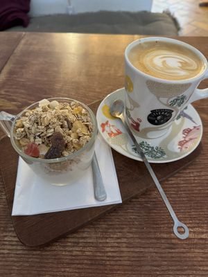 Vegan yogurt and granola with oat latte   at Beans and Tales in Malmo