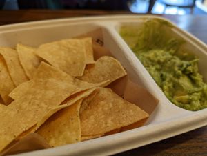 Half eaten gauc and chips (delicious) at Raiz in New York City