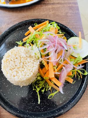 Rice and salad (comes with stew)  at Zona ProSalud in Guatape
