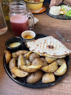 Pocket burrito with jugo del día  at Zona ProSalud in Guatape