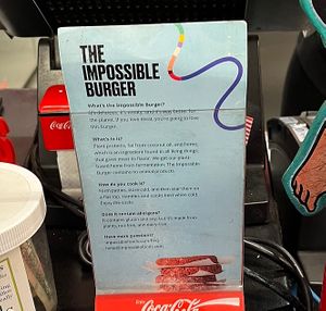 Ad at the cash register 👍  at Penelope's in Estes Park