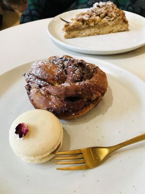 Vanilla-passionfruit macaron, cinnamon-cardamom bun and apple pie (front to back)   at Wyld in Stuttgart