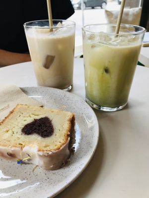 Lemon cake with chocolate heart and two lattes   at Wyld in Stuttgart