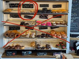 That’s where today’s donut flavor was located. Up top, 2nd from left.  at Duke's Donut Worx in Mashpee