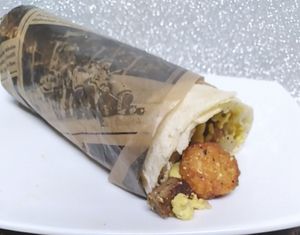 The Rosarito Breakfast burrito is a super-fast and easy breakfast staple. Beyond Breakfast sausage, Just Egg, sautéed bell pepper and onion, seasoned tater crowns, and Daiya shred at Atypical Vegan n More in Canton