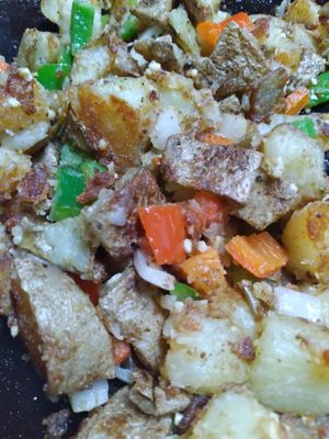 Our Hearty Harvey Scramble will keep you coming back. Made with Beyond Breakfast Sausage, Just Egg, Welcome Homefries and topped with Daiya Mexican shreds.  at Atypical Vegan n More in Canton