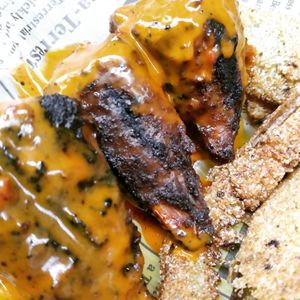 Our Vegan Wings are marinated to perfection, ensuring that every bite is packed with an explosion of flavors. Our secret blend of herbs, spices, and natural ingredients creates a t at Atypical Vegan n More in Canton