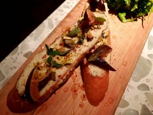 Bruschetta with ricotta, figs, and pistachios at Coletta in New York City