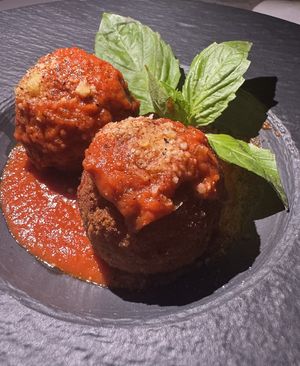 Pork fennel arancini  at Coletta in New York City