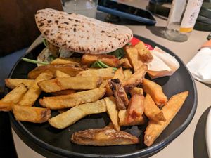Falafel burger pita with fries at Café de Jaren in Amsterdam