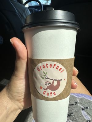 Cute logo.   This was a mushroom coffee with oat milk.. a little sweet for me but still good   at Gratefuel Cafe in Fort Lauderdale