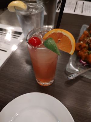 Mumbai Mai Tai: sailor jerry spiced rum + bacardi superior + amaretto di amore + orange curacao at Noon Mirch in Webster