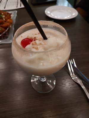 KERALA PINA COLADA: old monk rum + malibu coconut rum + coconut cream + pineapple juice at Noon Mirch in Webster