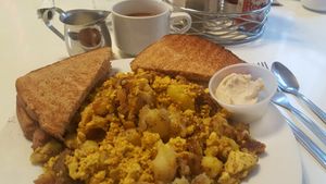 Tofu scramble w potatoes, vegan sausage & vegan butter; coffee w almond milk at Butter Cafe in Dayton