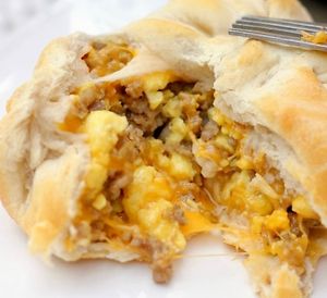 Stuffed breakfast biscuits with maple sausage, cheddar and egg (vegan of course) at The Sweet Botanist Plant Based - Cloud Kitchen in Dallastown