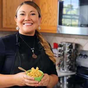 Amber, owner of The Sweet Botanist with street corn salad  at The Sweet Botanist Plant Based - Cloud Kitchen in Dallastown