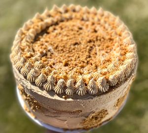 Peanut butter vanilla cake with cookie crumble featured currently at Revival Social Club in downtown York, PA. at The Sweet Botanist Plant Based - Cloud Kitchen in Dallastown