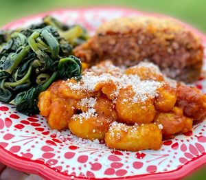 Italian meatloaf with gnocchi and sautéed spinach  at The Sweet Botanist Plant Based - Cloud Kitchen in Dallastown