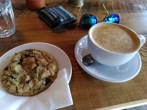 Chocolate and hazelnut cookie and decaf oat latte (June 2022) at Bluebird Bakery in York