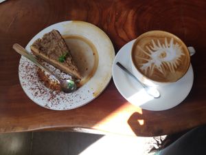 Carrot cake and cappuccino with coconut milk at WAIRA Ice Cream & Speciality Coffee in Minca