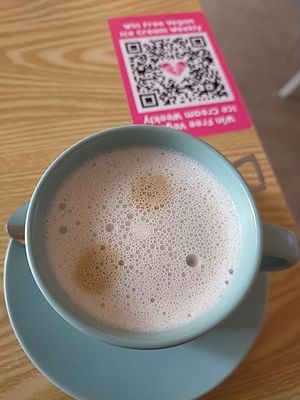 Latte with oat milk at Heartbreak Melts in Northeast Singapore