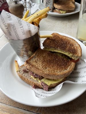 Plant based salt “beef” sandwich with vegan cheese, mustard on bloomer bread and skin on fries  at Lulworth Cove Inn in Wareham