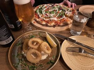 Kebab pizza and calamari  at Veganska Ölbaren in Stockholm