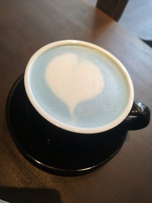 Lavender latte with oat milk, unsweetened at Kafka Cafe in Ho Chi Minh City