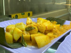 Curry potatoes with cauliflower at Peranakan Vegetarian in Central Singapore
