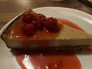 Cheesecake with cherries on top   at Planta in Bethesda