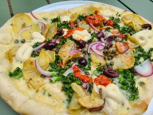 Pizza with olives & peppers at Planta in Bethesda