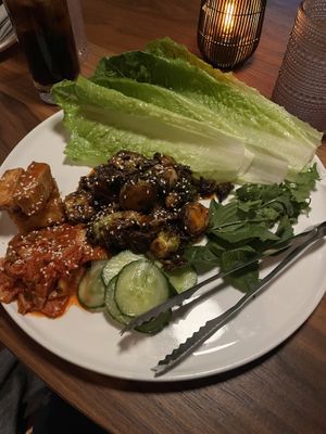 Lettuce wraps with tofu, kimchi, and Brussels sprouts 🥰🥰  at Planta in Bethesda