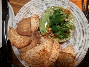 Avocado lime tartare salad with beetroot tuna and taro chips, excellent at Planta in Bethesda