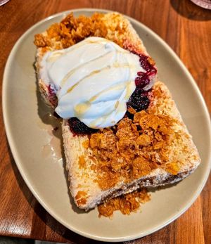 French Toast: Corn flake granola, berry compote, maple syrup at Planta in Bethesda