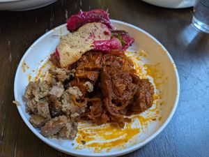 Goulash and some beetroot carpaccio at Tisch in Vienna