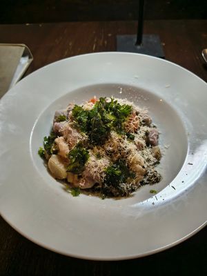 Pickled lemon cabbage with 2 types of colourful gnocchi, with purple kale, sorrel, and Siberia kale. at Tisch in Vienna