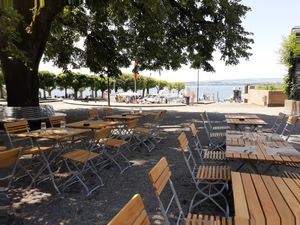 Outdoor seating with view at Gotthärdli am See in Zug
