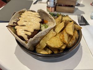 Cheeky Rainbow Pitta Pocket with spicy wedges 🌈😍 🥗   at Billy Byrnes Gastro Bar & Venue in Kilkenny
