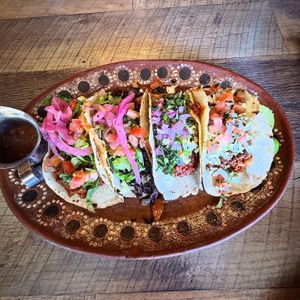 Tacos of different proteins   at Del Cielo Tamales in Tucson